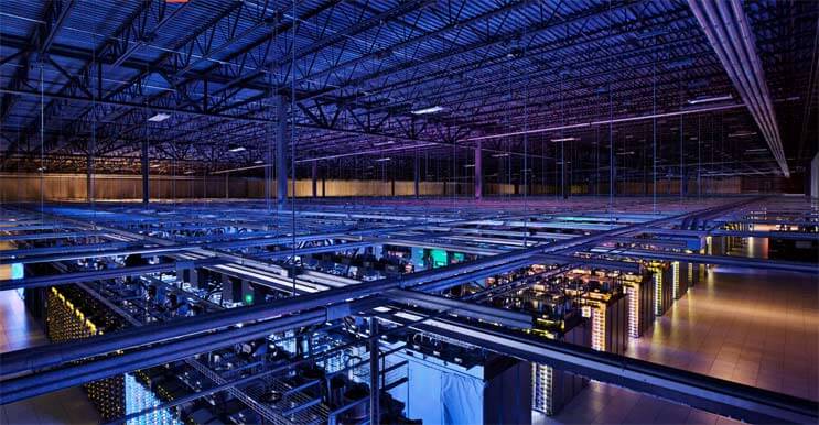 An overhead view of the interior of a Google data center in Council Bluffs, Iowa, where the search giants houses one of the heaviest concentrations of its Internet infrastructure. (Photo: Google)